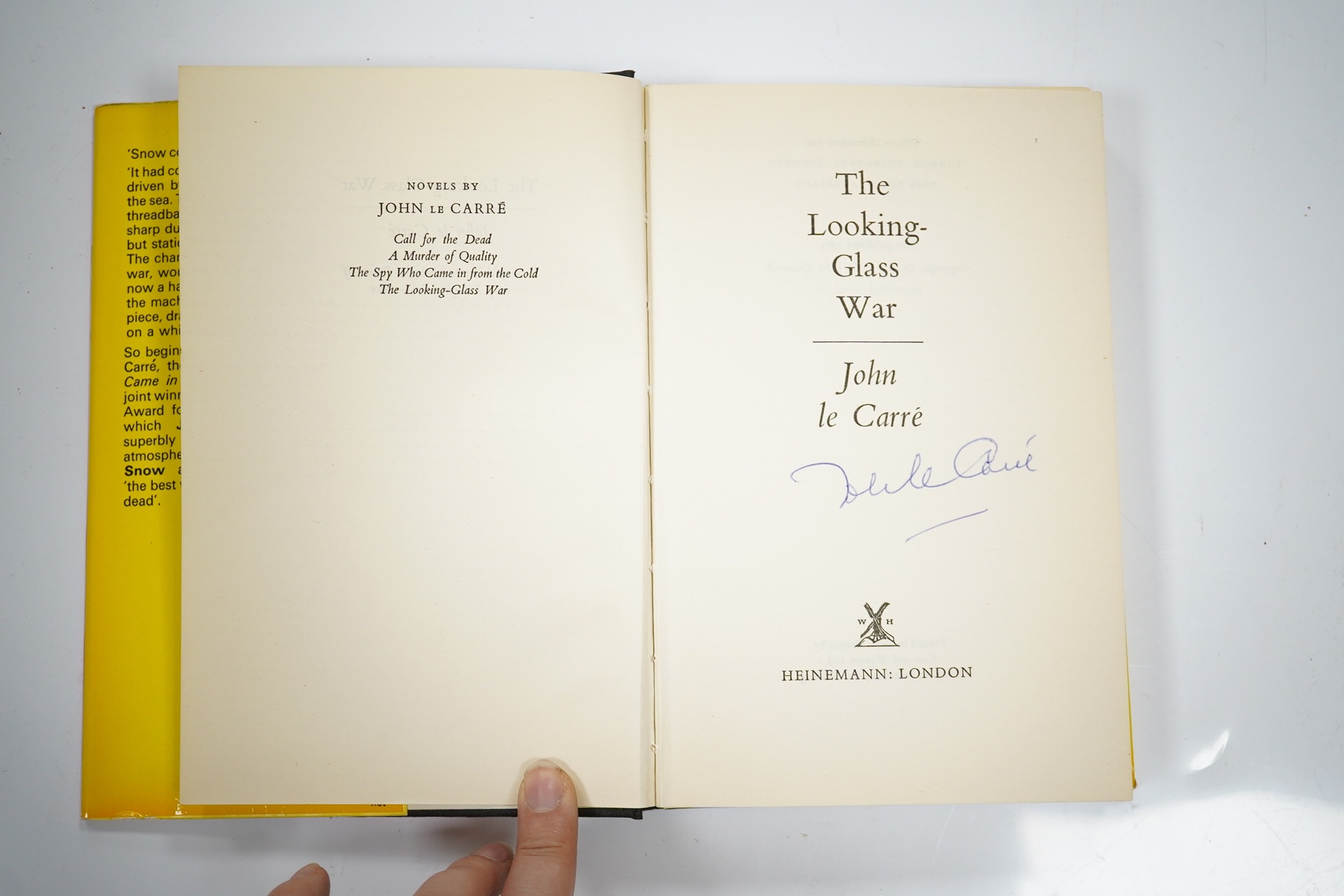 Le Carré, John - The Looking-Glass War. First Edition (signed by the author on title). publisher's cloth and d/wrapper. Heinemann, 1965